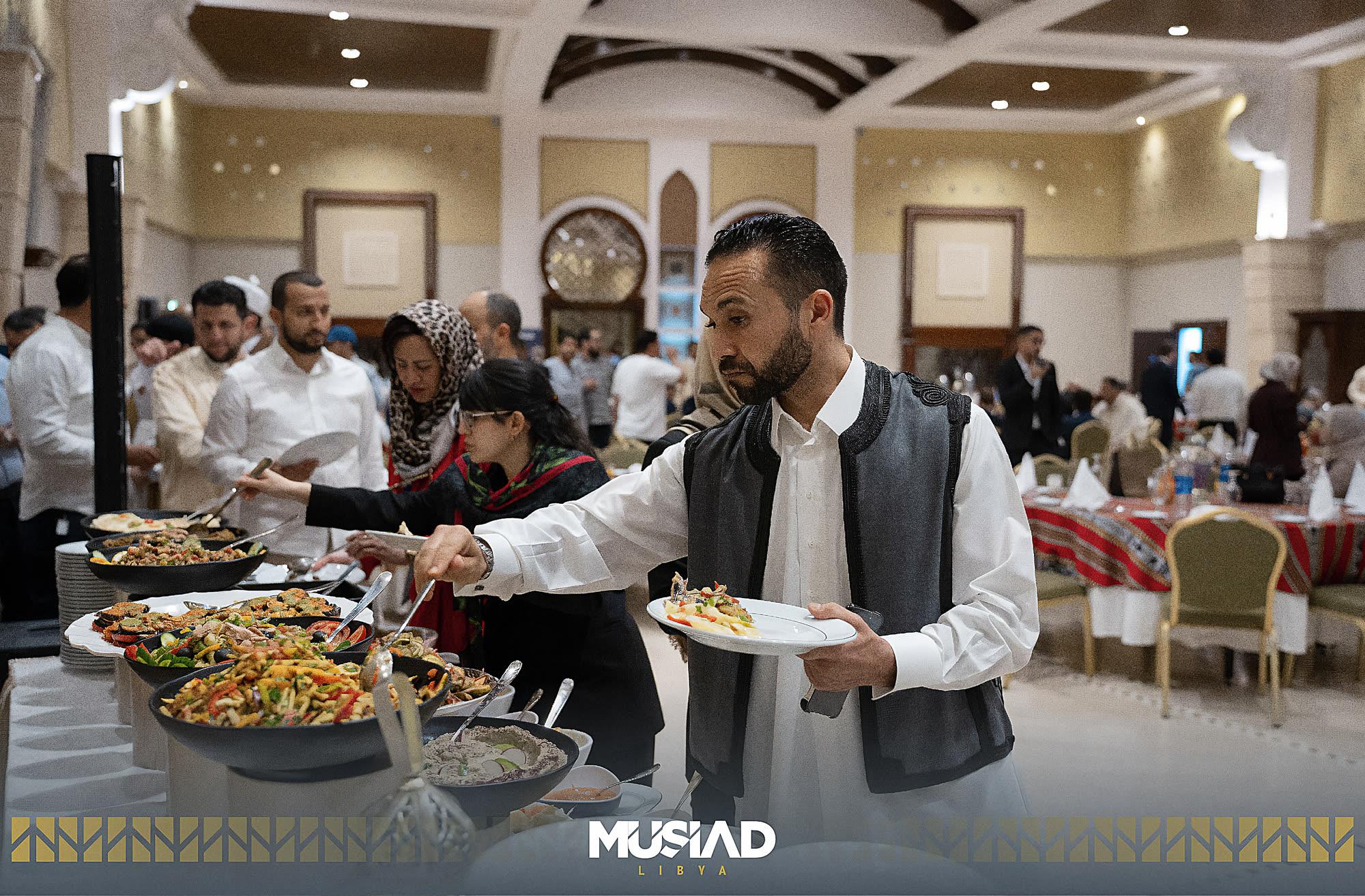 Guests at a large-scale business gathering during a coordinated event