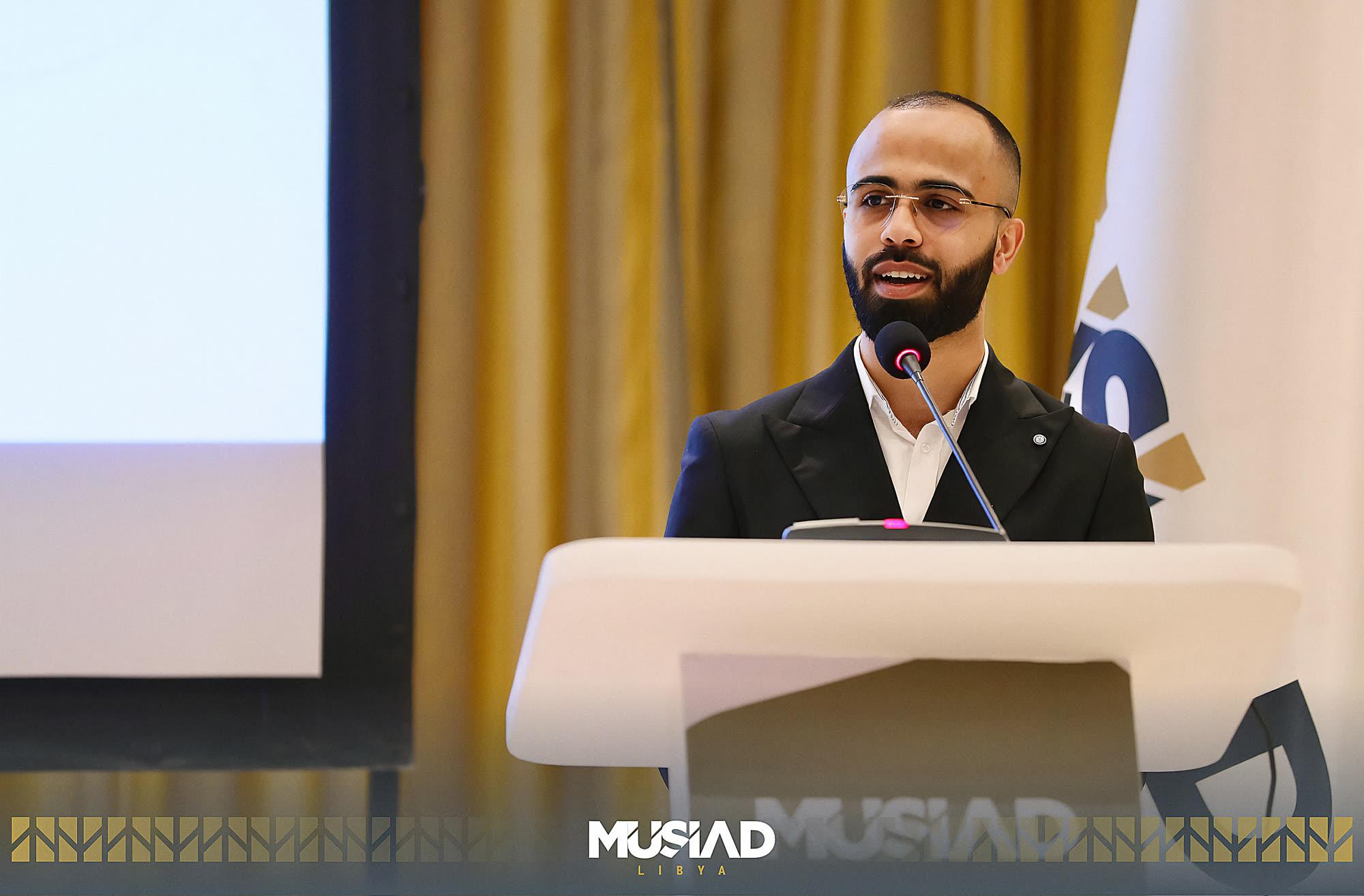 Speaker at the podium of an executive forum