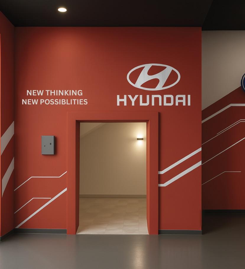 Second-floor entrance framed in Hyundai red — New Thinking, New Possibilities brand wall